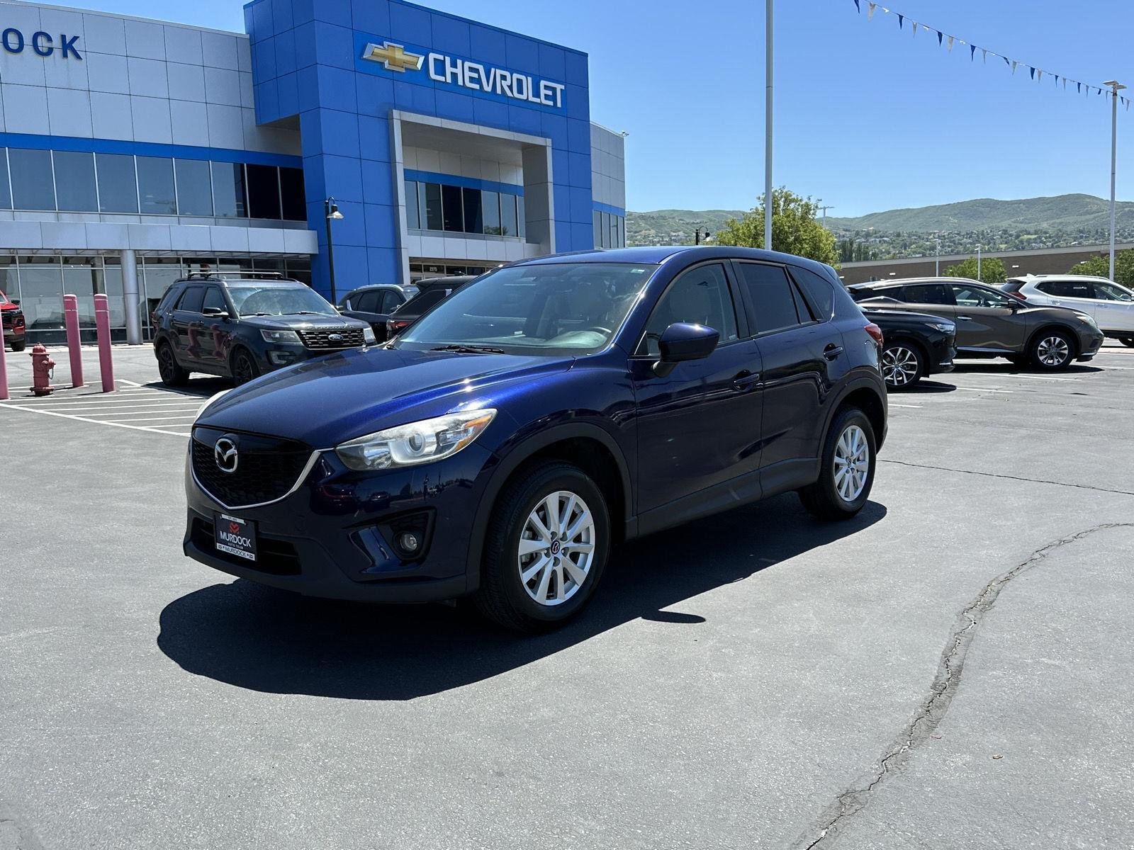 Used 2013 Mazda CX-5 Touring with VIN JM3KE4CEXD0101925 for sale in Woods Cross, UT