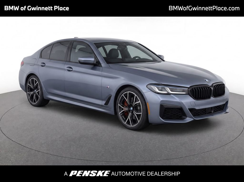 Used 2022 Bluestone Metallic BMW 530e iPerformance image 1