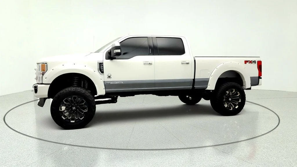 Used 2022 Star White Metallic Tri-Coat Ford Black Widow LARIAT 4WD Crew Cab 6.75