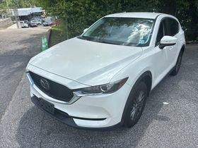 Used 2019 Snowflake White Pearl Mica Mazda Touring image 1