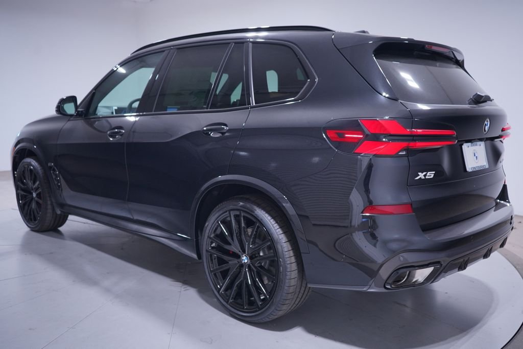 New 2026 Black Sapphire Metallic BMW sDrive40i image 3