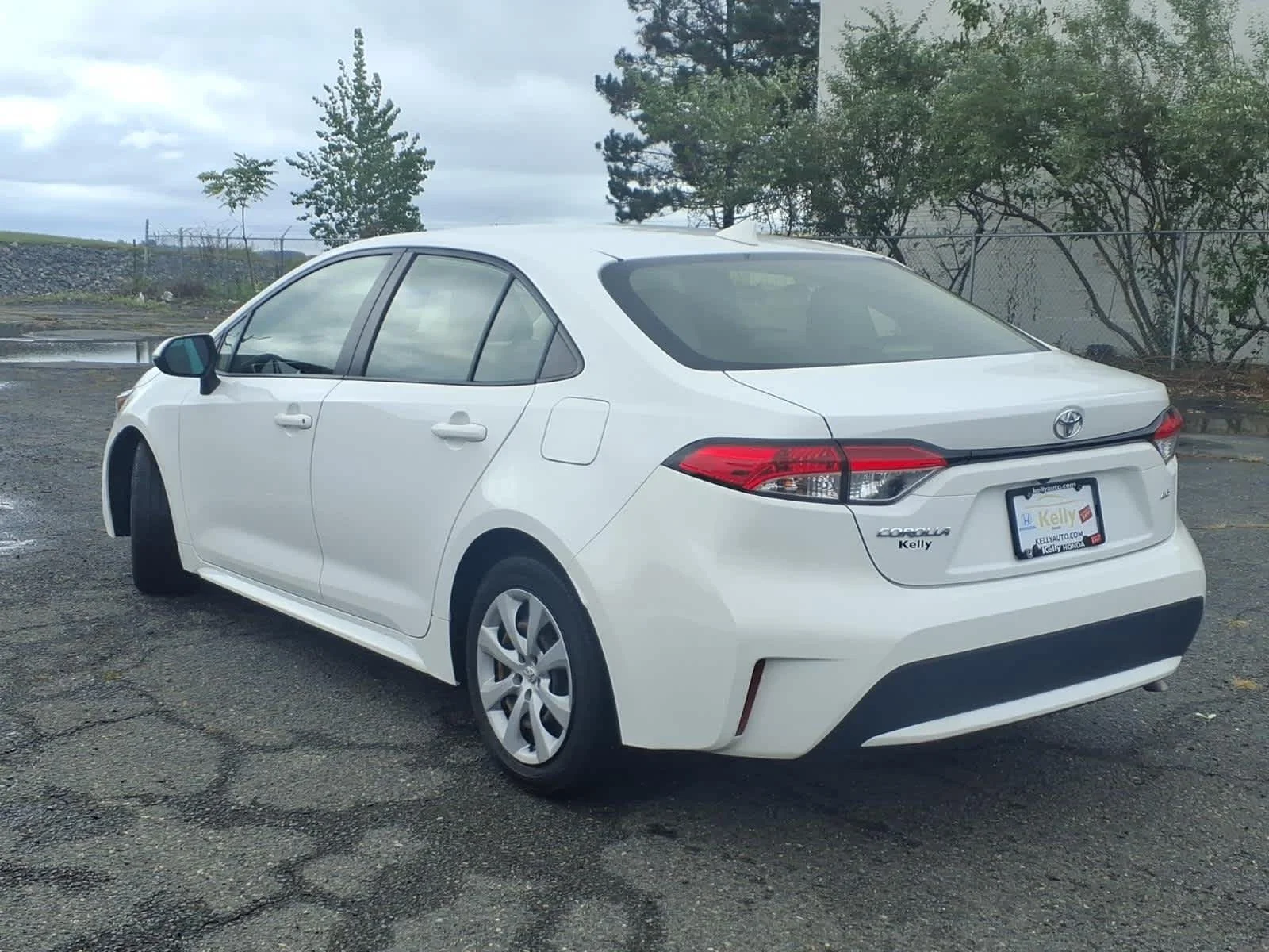 Used 2021 Super White Toyota LE image 7