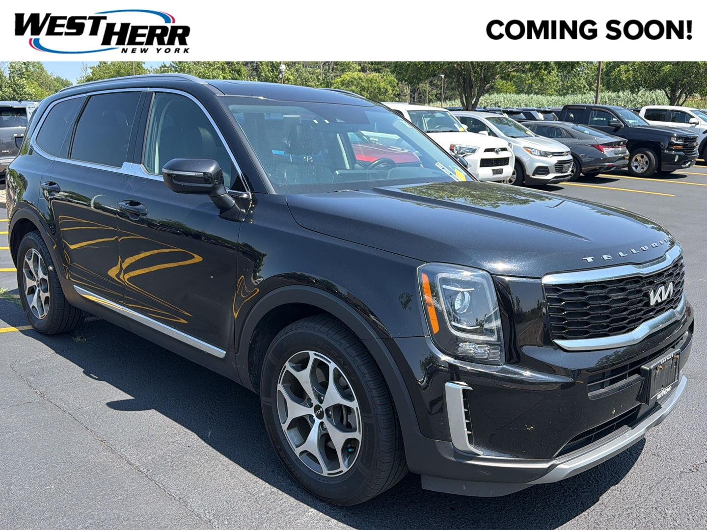 Used 2022 Ebony Black Kia EX image 1