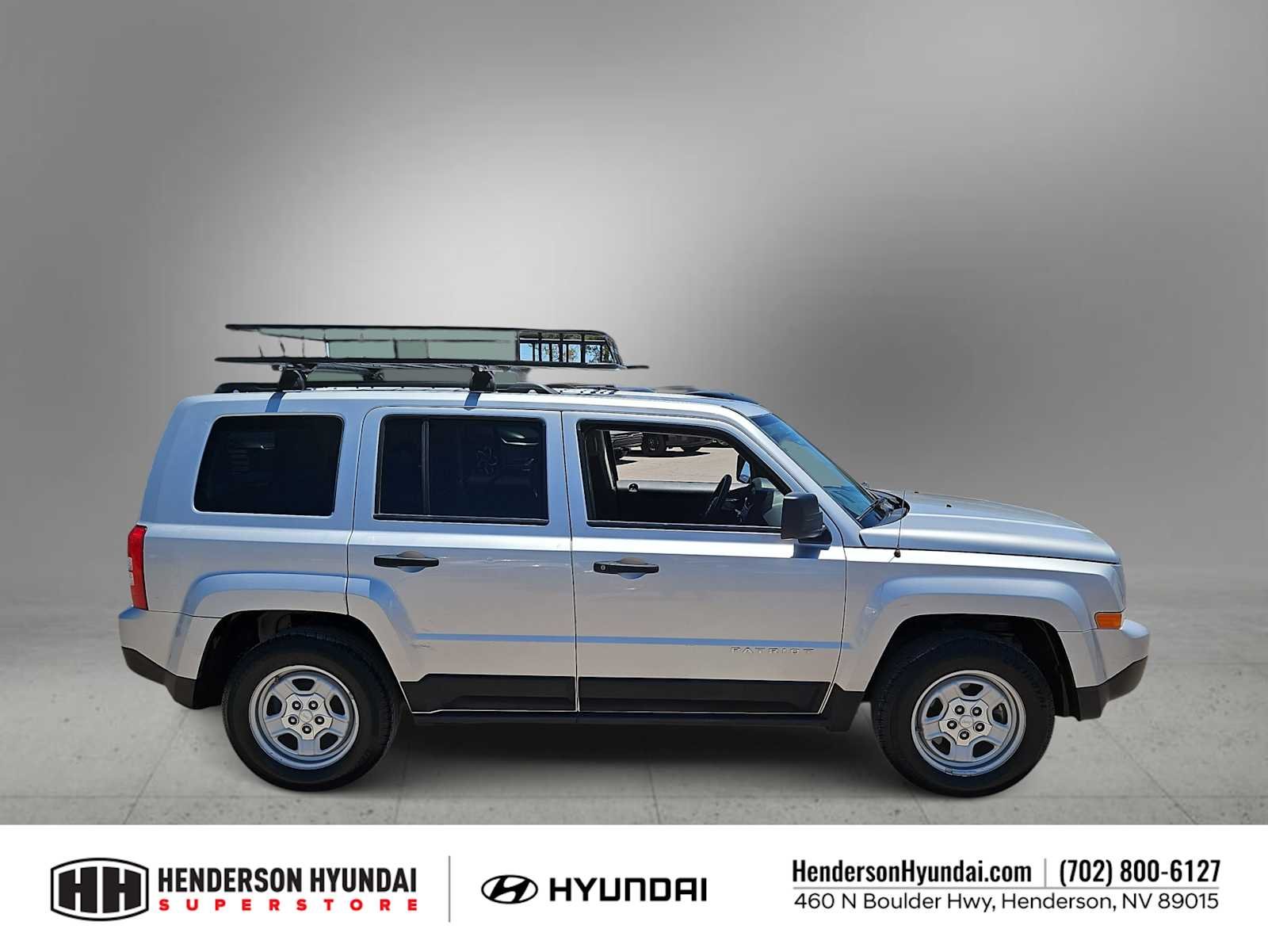 Used 2011 Bright Silver Metallic Jeep Sport image 9