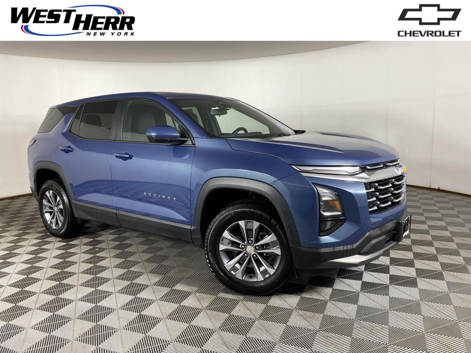 Used 2025 Lakeshore Blue Metallic Chevrolet AWD LT image 1