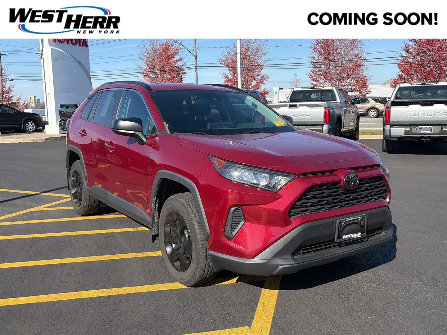 Used 2019 Ruby Flare Pearl Toyota LE image 1