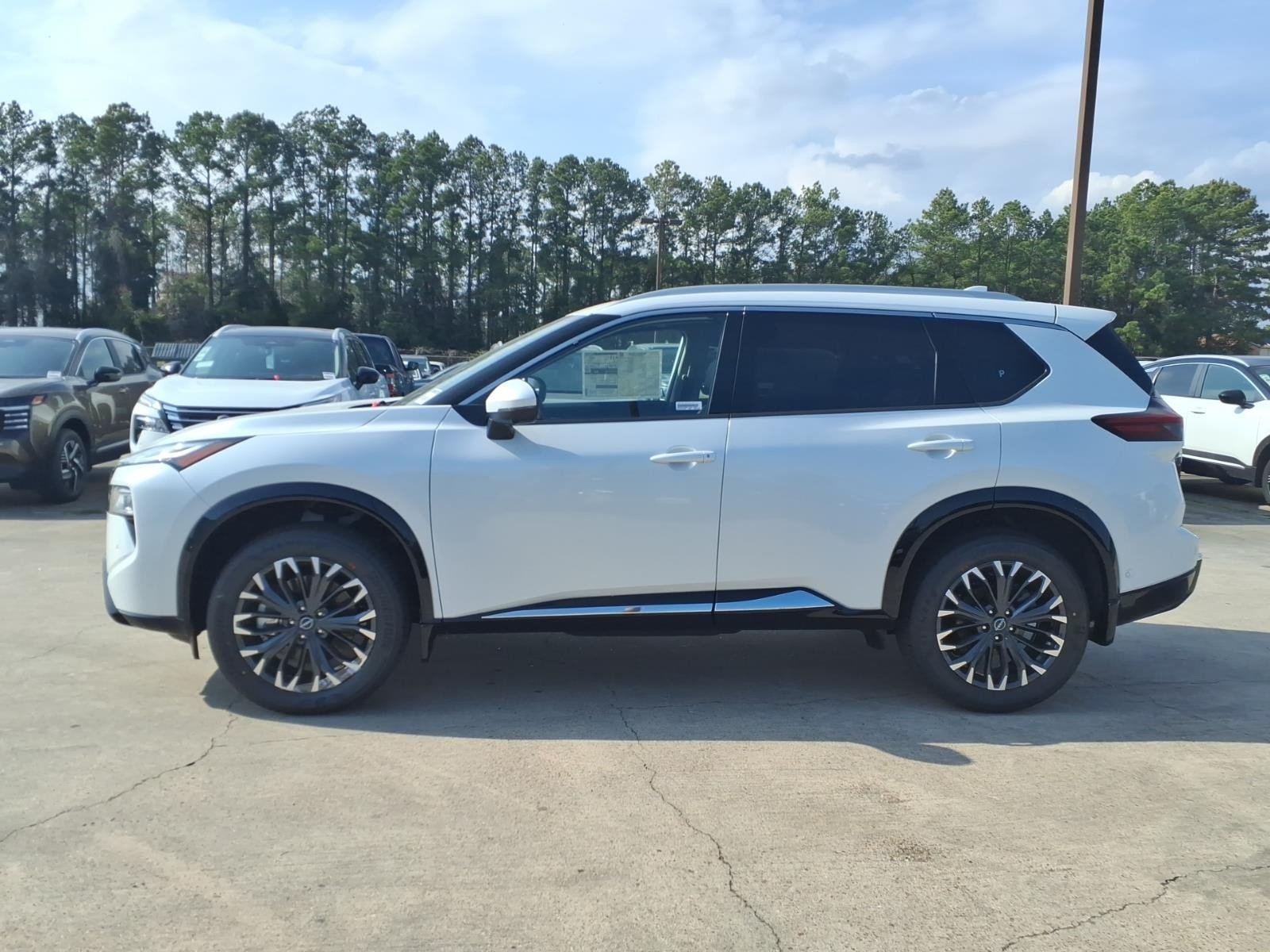 2026 Nissan Rogue Platinum White at Robbins Nissan