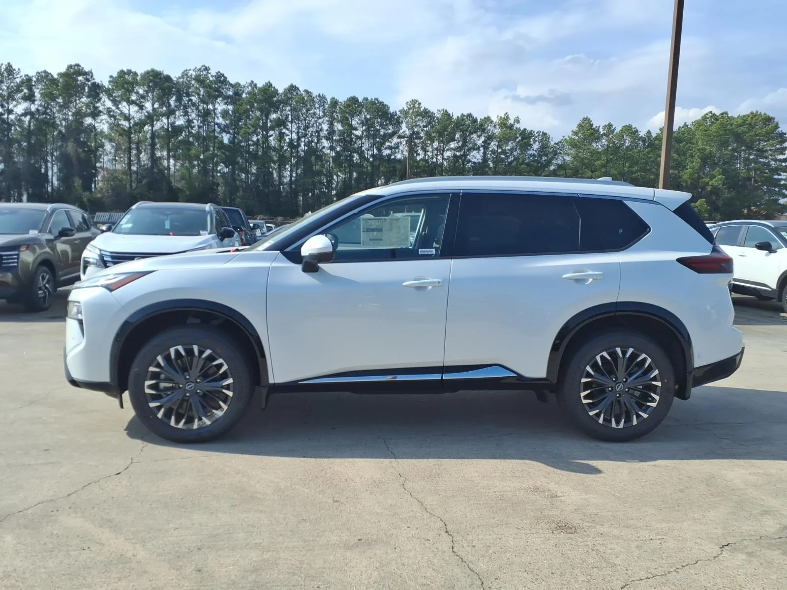 2026 Nissan Rogue Platinum White at Robbins Nissan