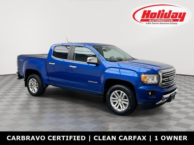 Used 2020 Marine Blue Metallic GMC 4WD SLT image 1