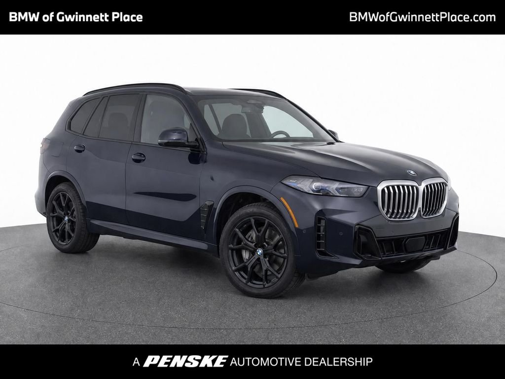 Certified Used 2024 Black Sapphire Metallic BMW sDrive40i image 1