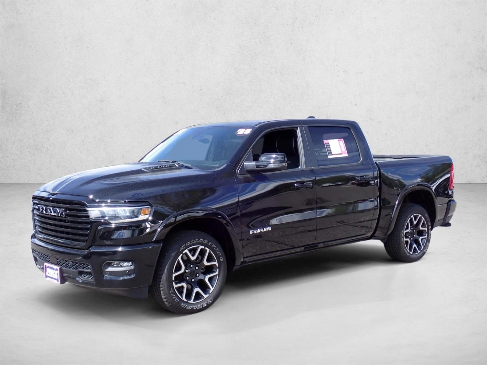 Used 2025 Diamond Black Crystal Pearlcoat Ram Laramie image 1
