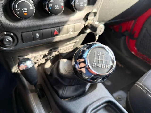 Used 2014 Red Jeep Unlimited Sahara image 20