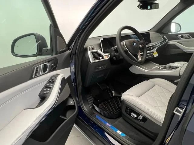 New 2026 Tanzanite Blue II Metallic BMW xDrive50e image 22