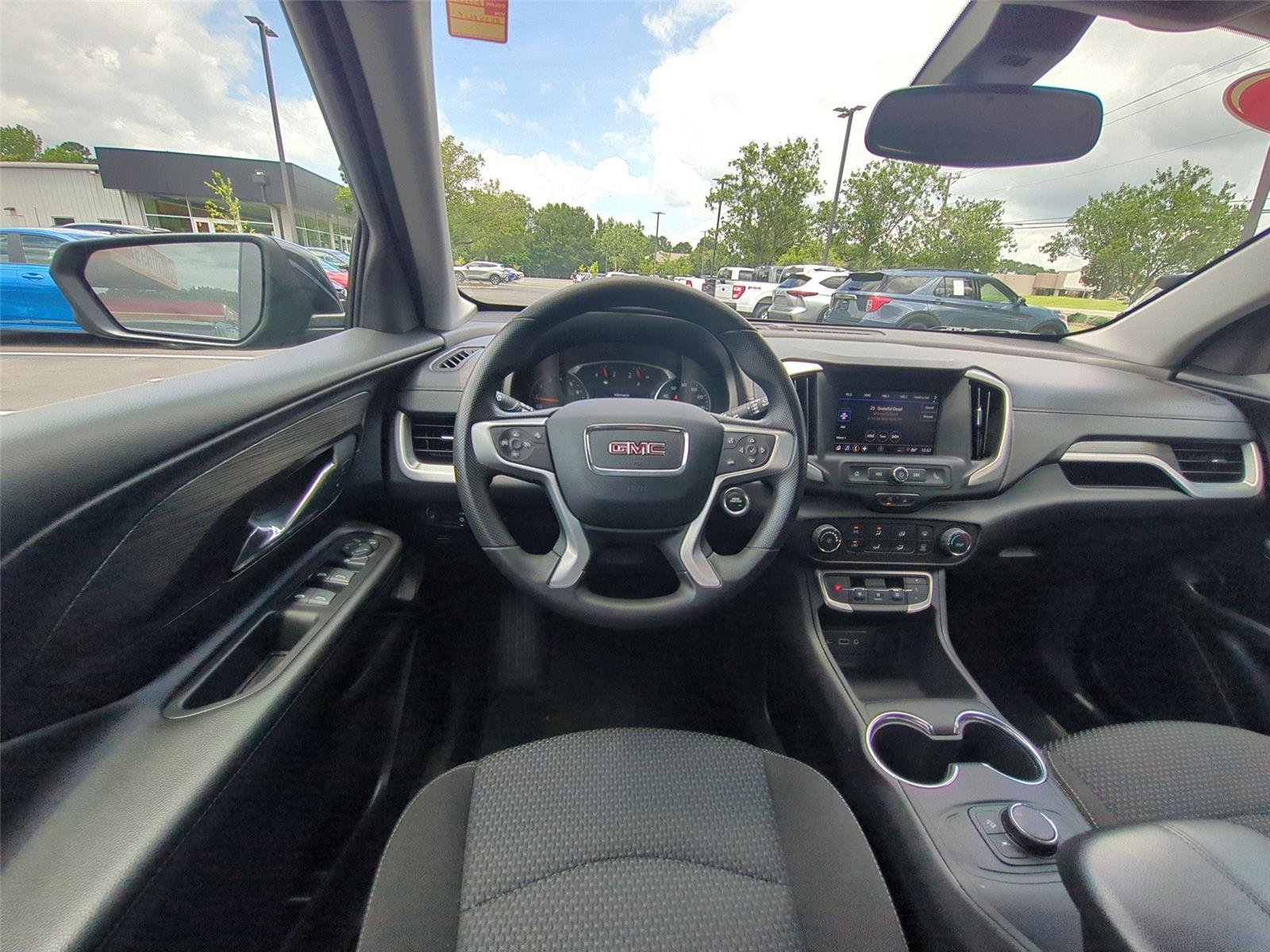 Used 2024 Ebony Twilight Metallic GMC SLE image 32