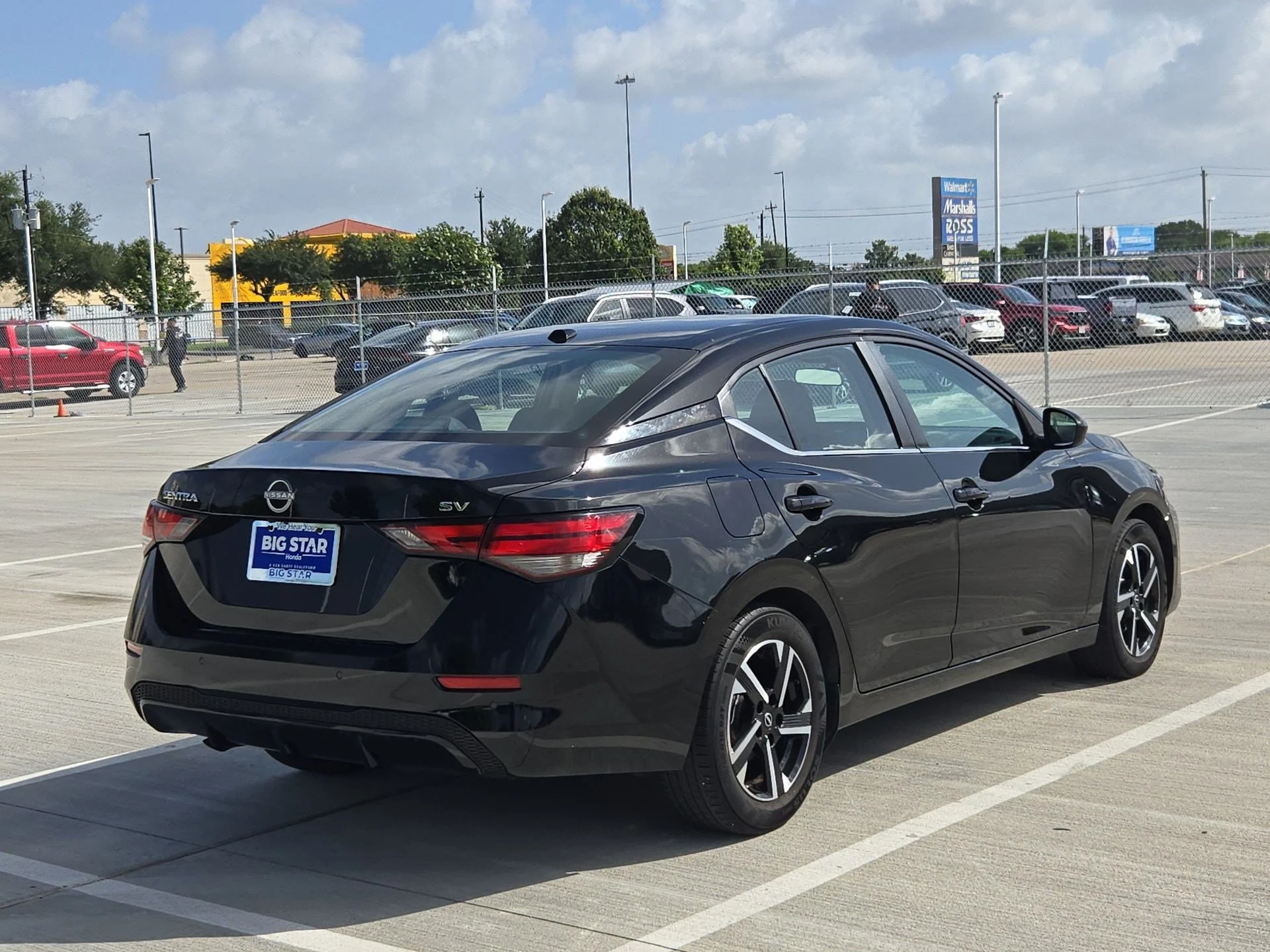 Used 2024 Super Black Nissan SV image 3