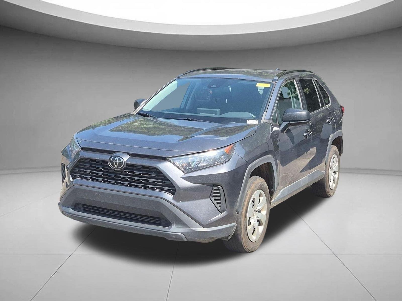 Used 2021 Magnetic Gray Metallic Toyota LE image 1