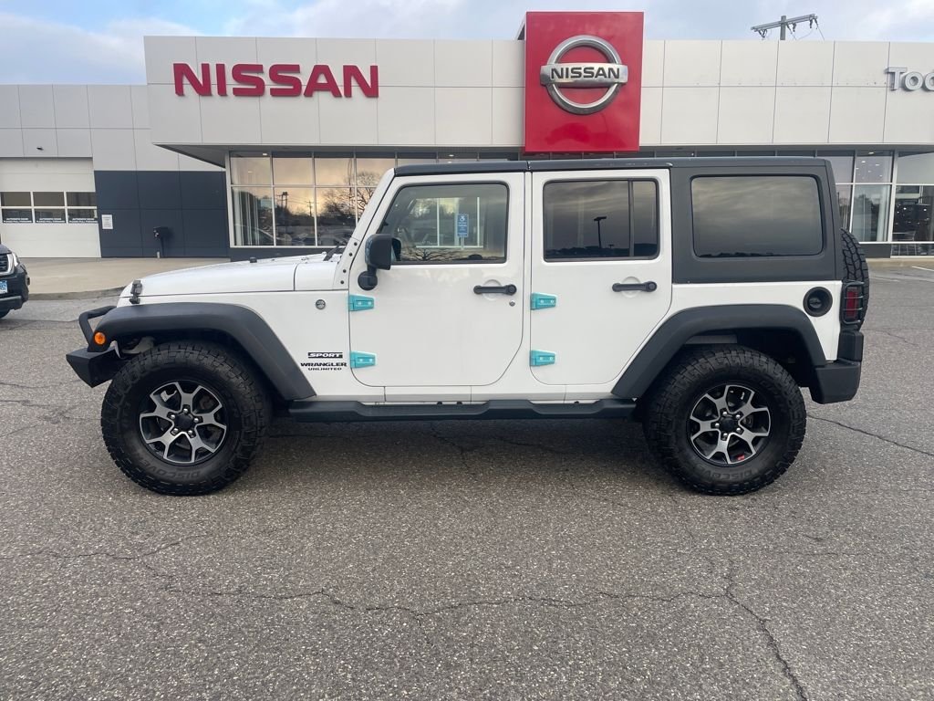 Used 2014 Jeep Wrangler Unlimited Sport with VIN 1C4BJWDG1EL121299 for sale in Torrington, CT