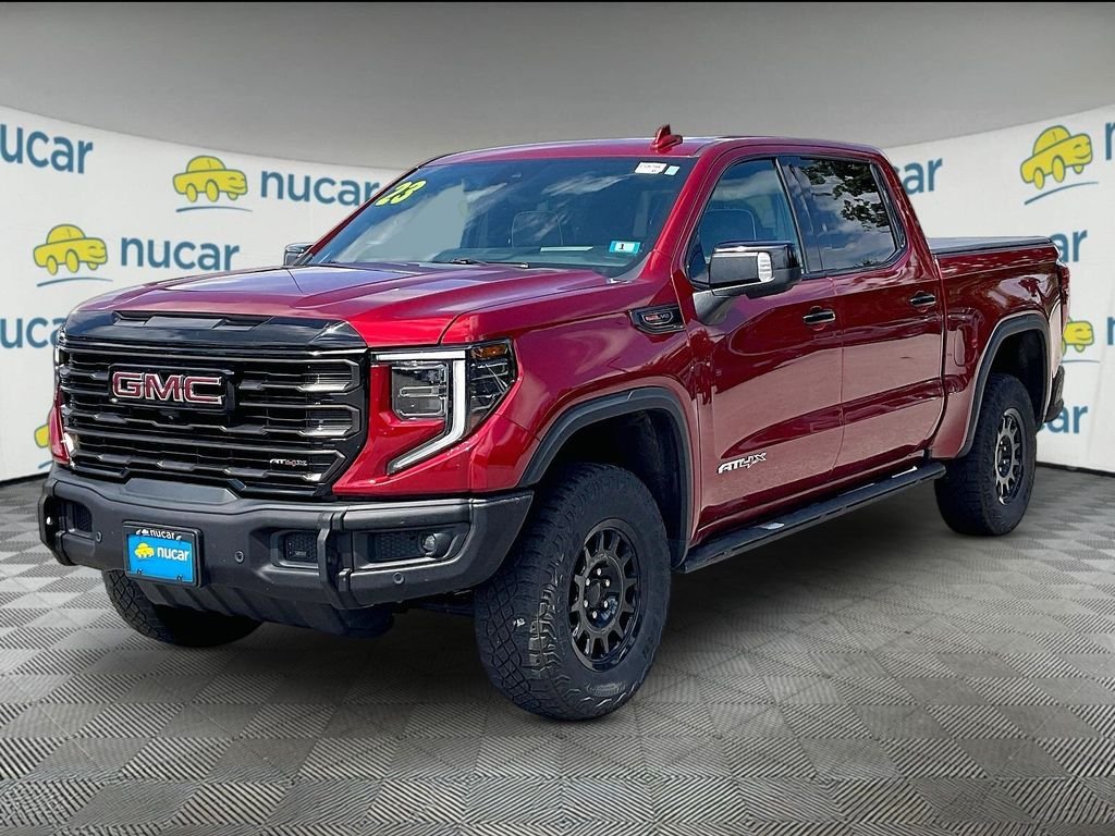 Used 2023 Volcanic Red Tintcoat GMC AT4X image 3