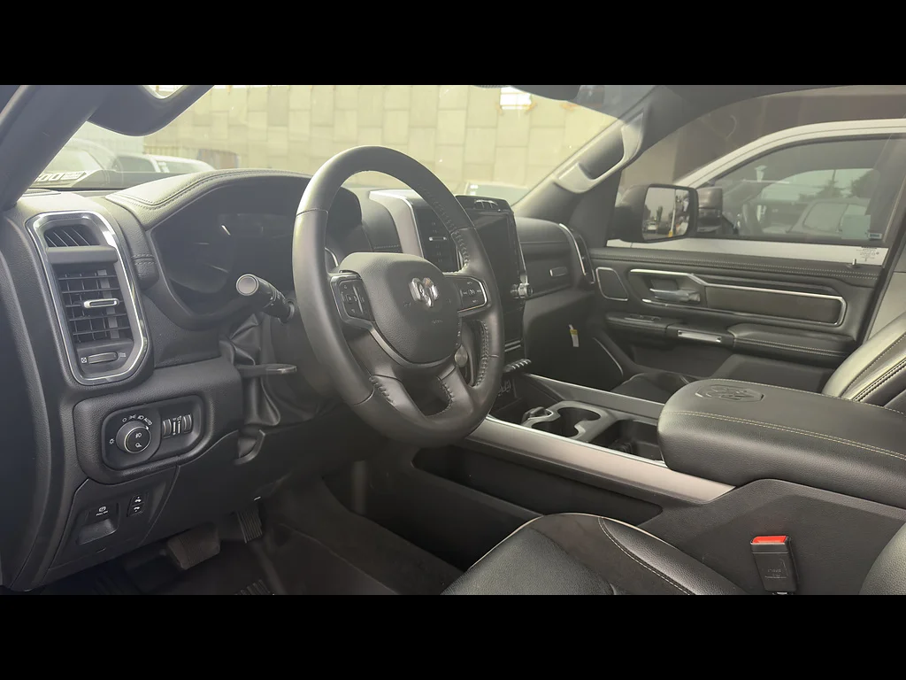 Used 2024 Diamond Black Crystal Pearl Coat Ram Laramie image 5