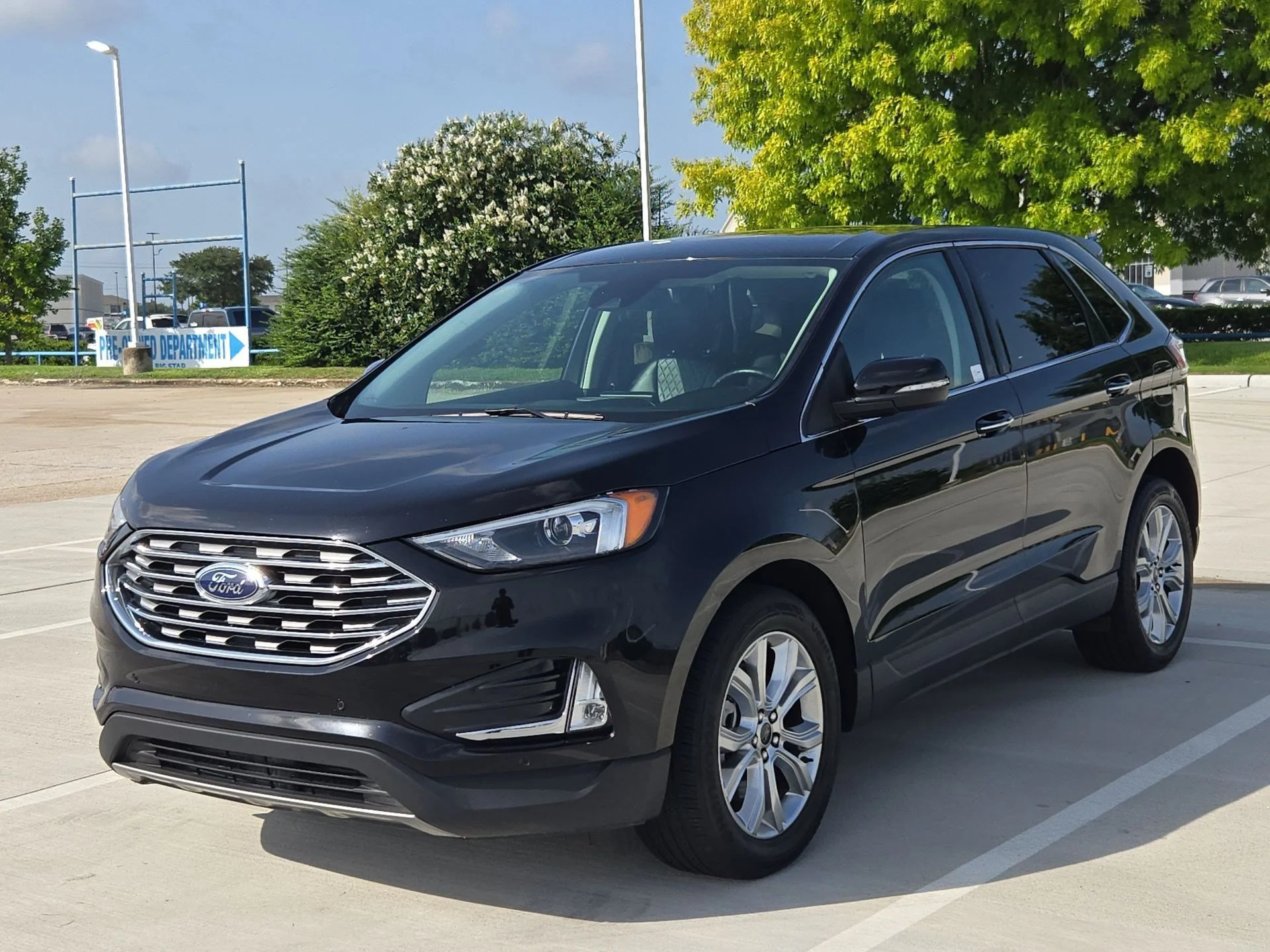 Used 2024 Black Metallic Ford Titanium image 7