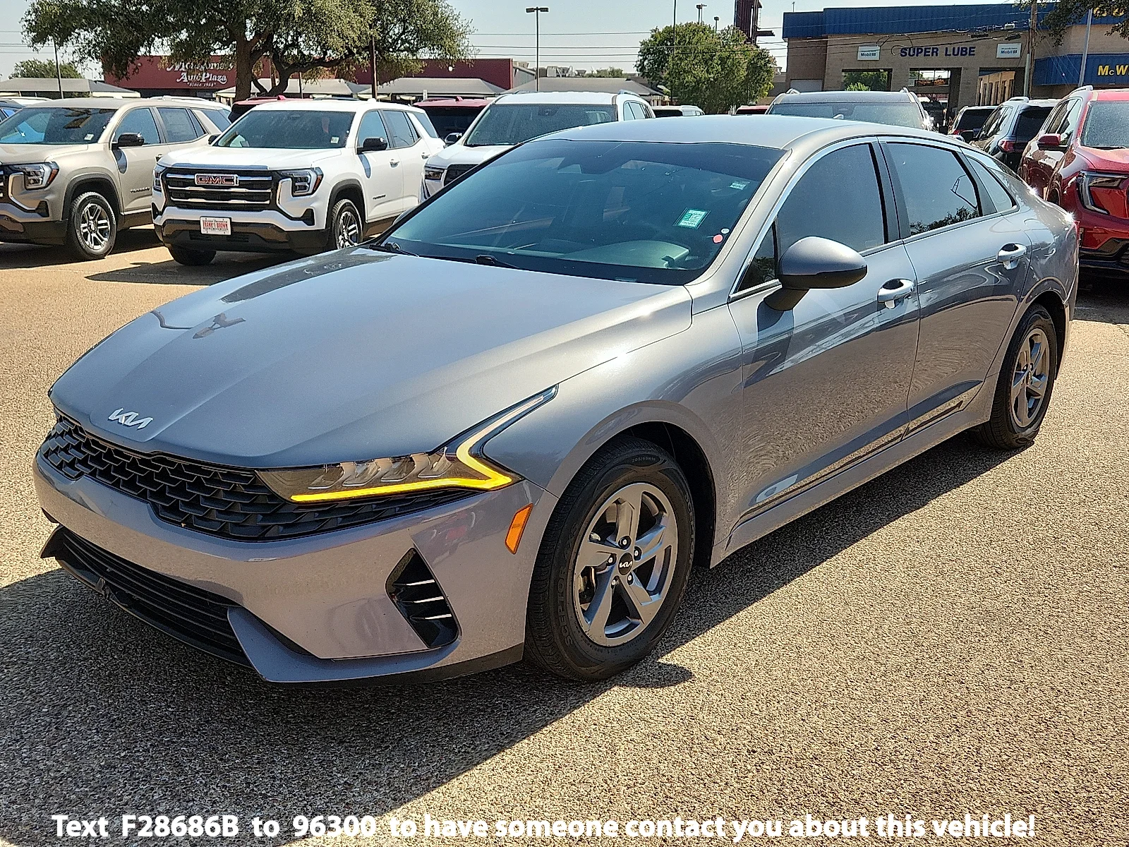 Used 2023 Silver Kia LXS image 1