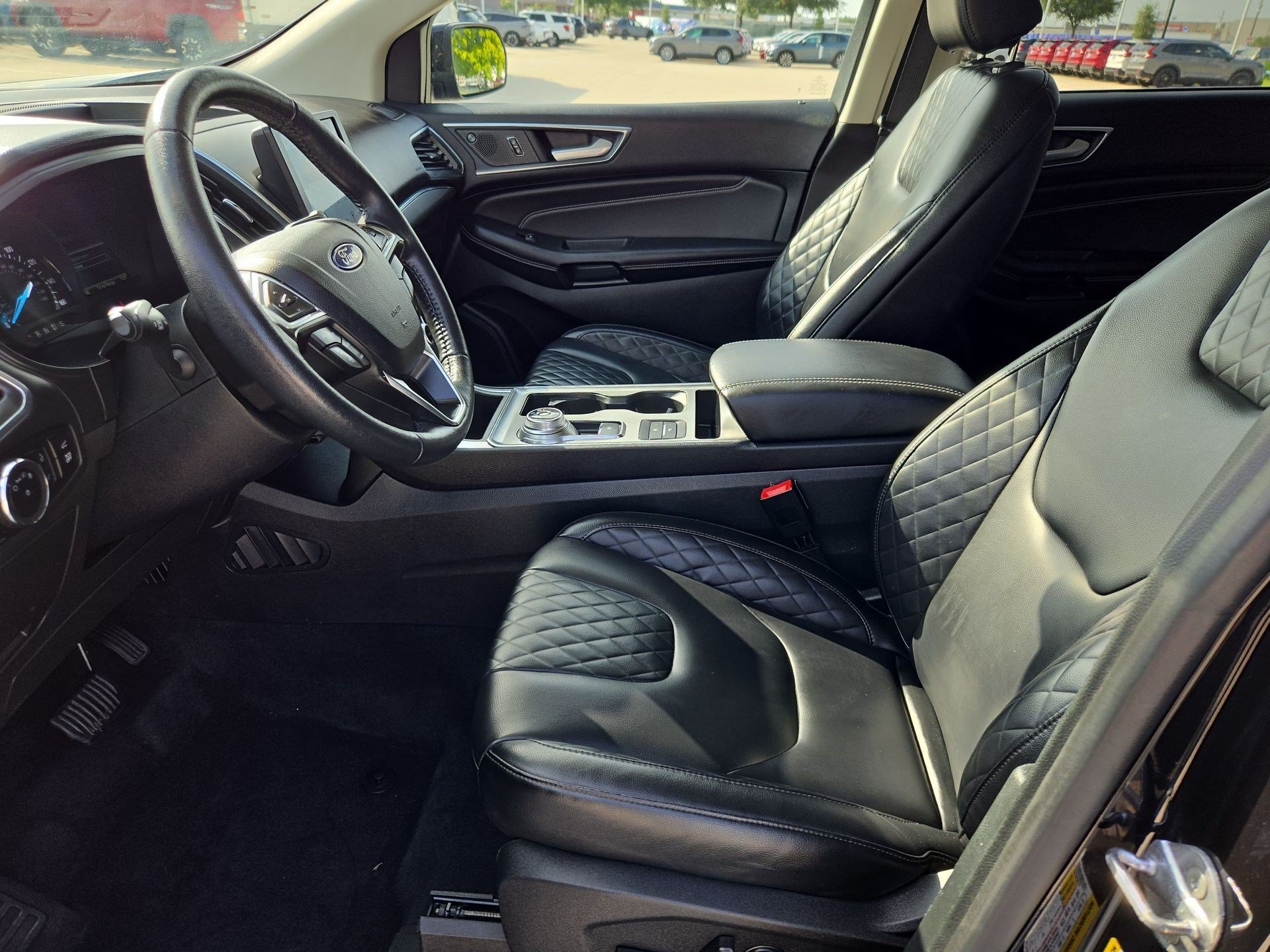 Used 2024 Black Metallic Ford Titanium image 14