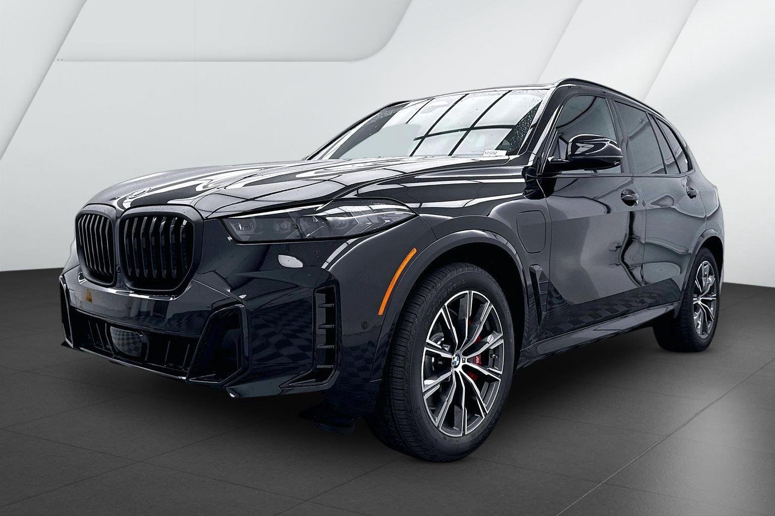 New 2026 Black Sapphire Metallic BMW xDrive50e image 3