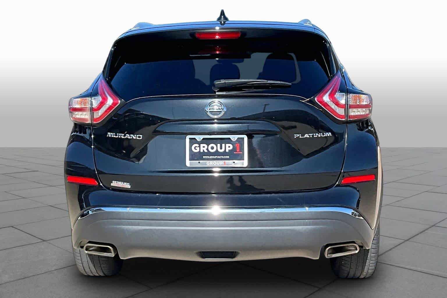 Used 2018 Magnetic Black Metallic Nissan Platinum image 4