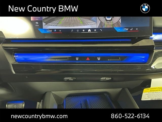 New 2026 Mineral White Metallic BMW 550e xDrive image 19