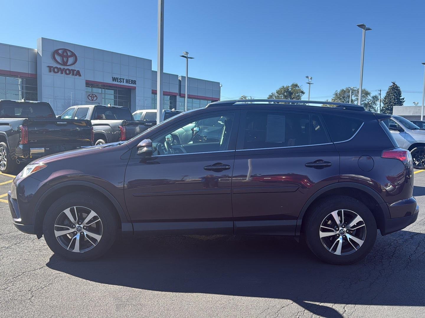 Used 2017 Black Currant Metallic Toyota XLE image 6