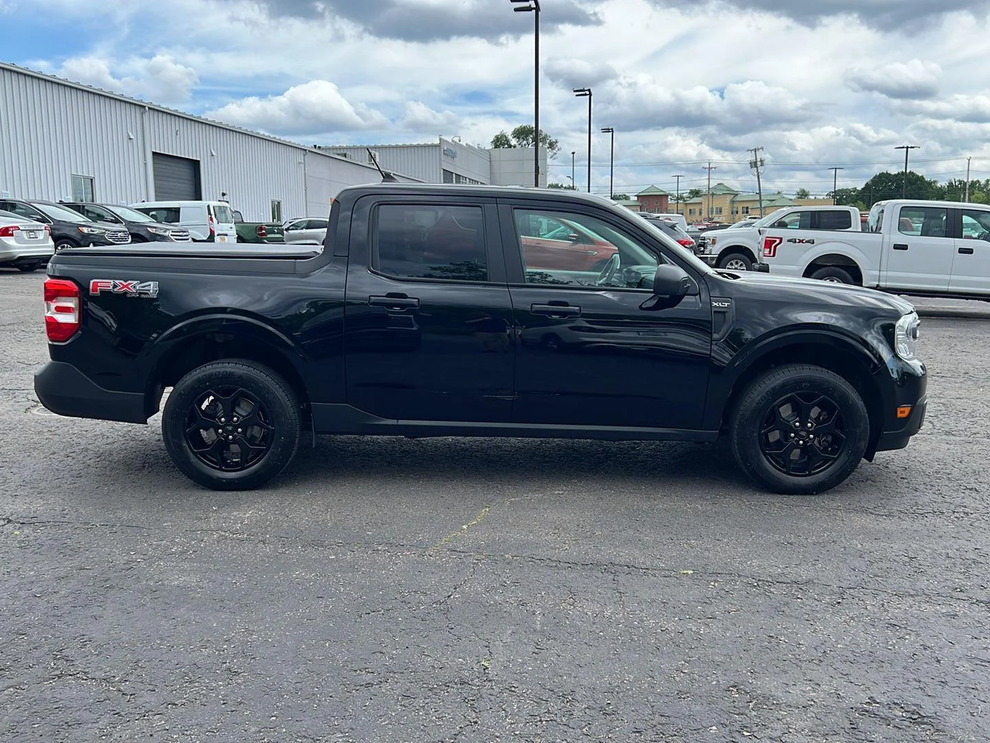 Used 2024 Shadow Black Ford XLT image 8