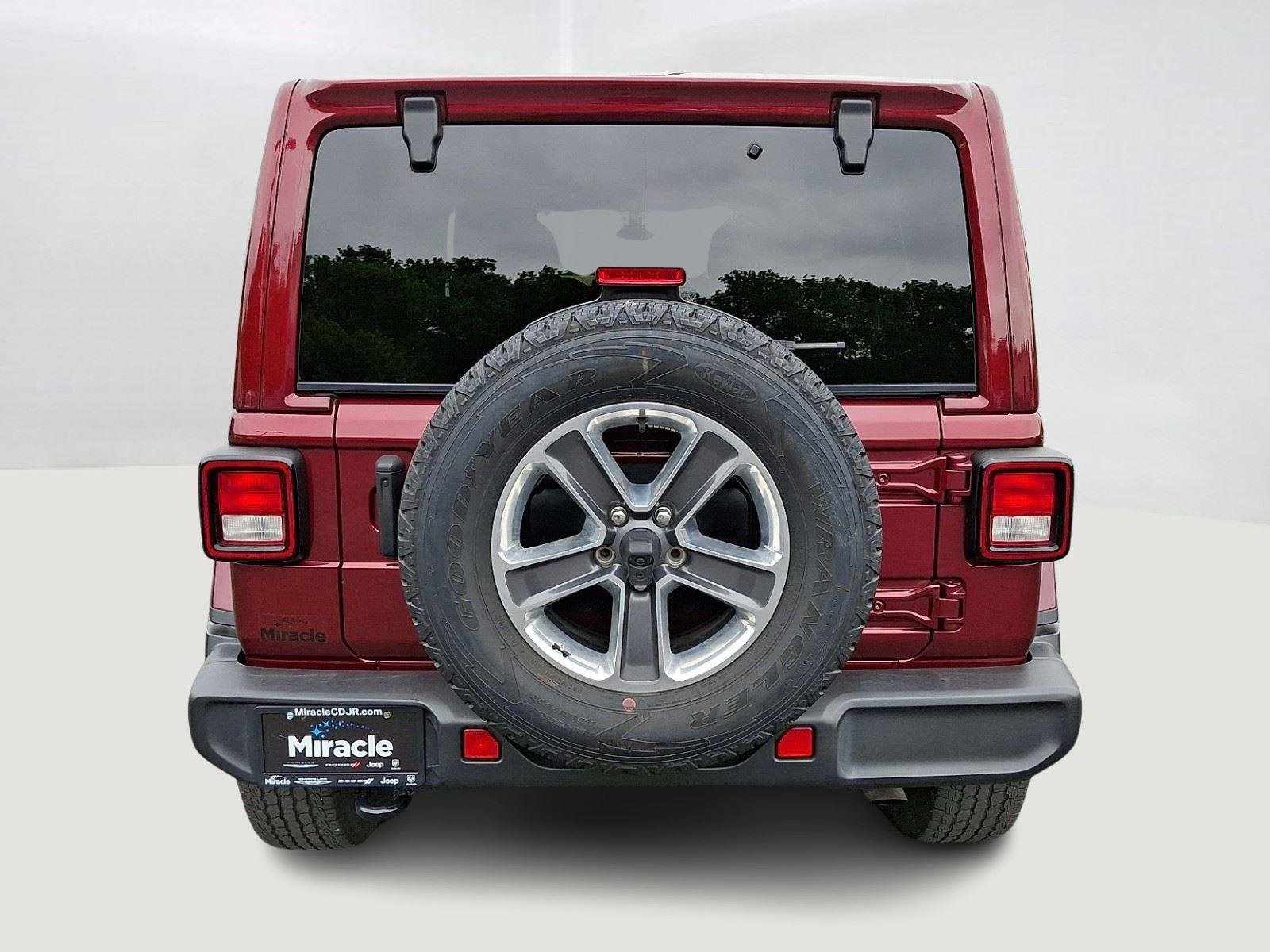 Used 2021 Snazzberry Pearlcoat Jeep Unlimited Sahara image 6
