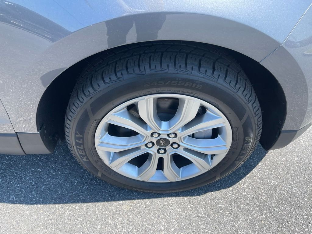 Certified Used 2024 Gray Metallic Ford Titanium image 14