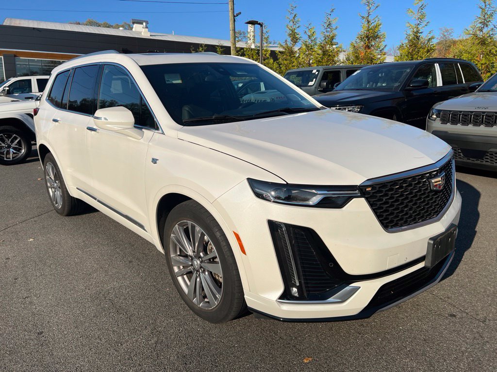 Used 2023 White Cadillac Premium Luxury image 1