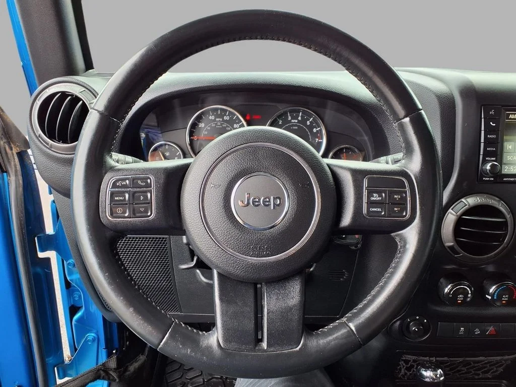 Used 2016 Blue Jeep Unlimited Sport image 16