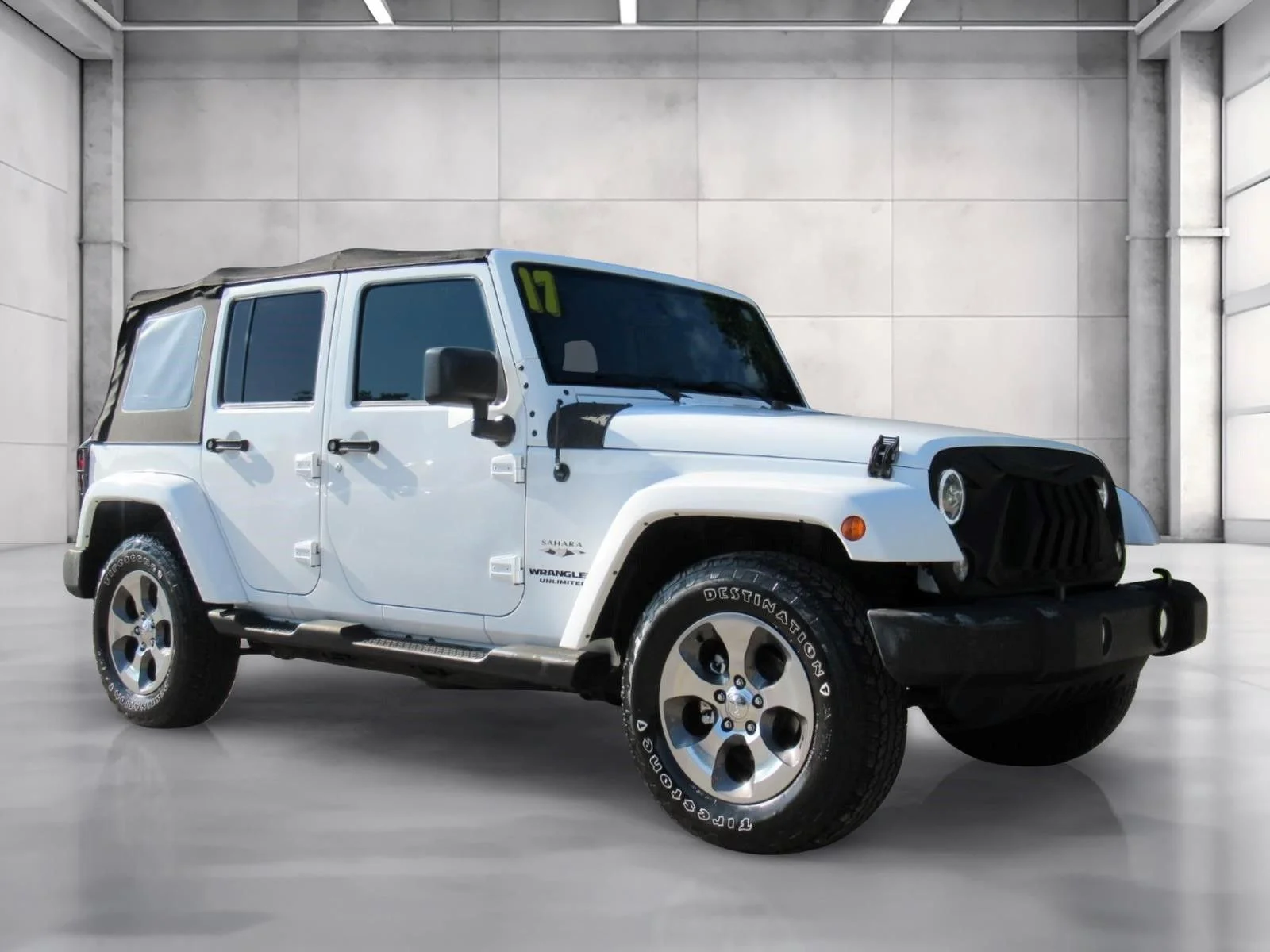 Used 2017 White Jeep Unlimited Sahara image 1