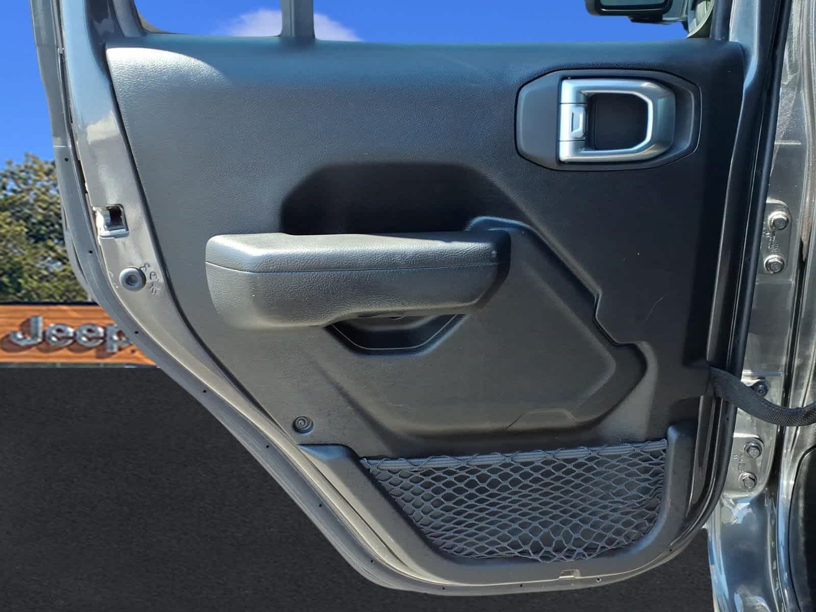 Used 2023 Granite Crystal Metallic Clearcoat Jeep Sport S image 28