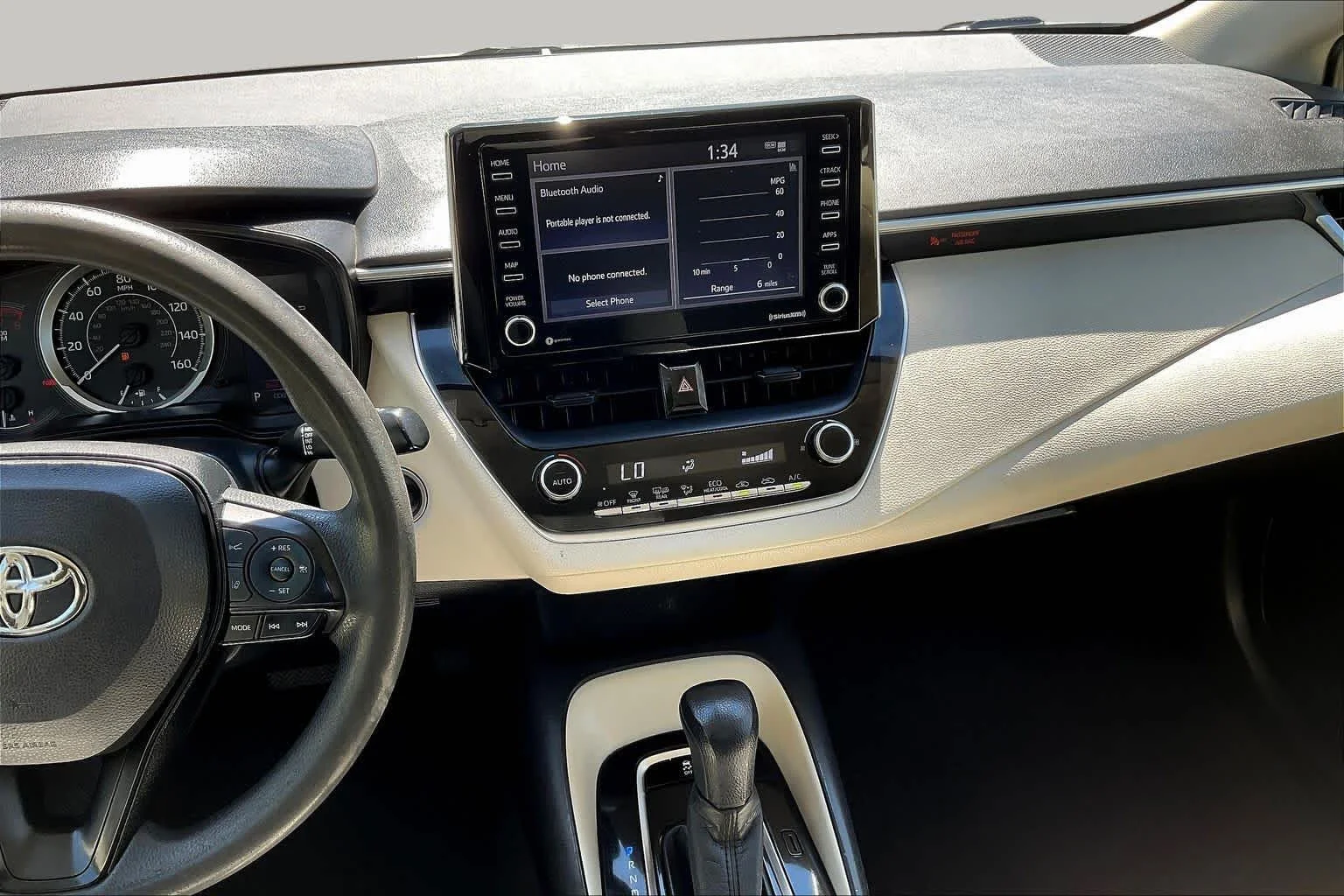 Used 2021 Super White Toyota LE image 7