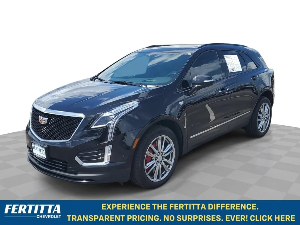 Used 2022 Stellar Black Metallic Cadillac Sport image 1
