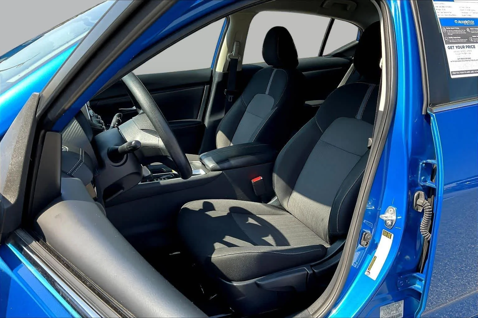 Used 2025 Electric Blue Metallic Nissan SV image 8