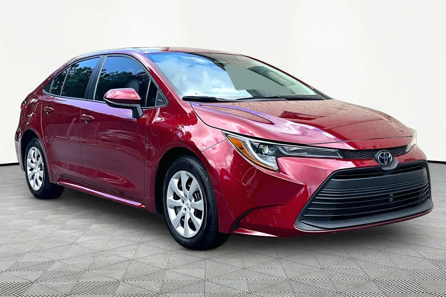 Used 2024 Ruby Flare Pearl Toyota LE image 3