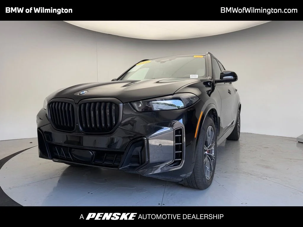 Certified Used 2024 Black BMW xDrive40i image 1