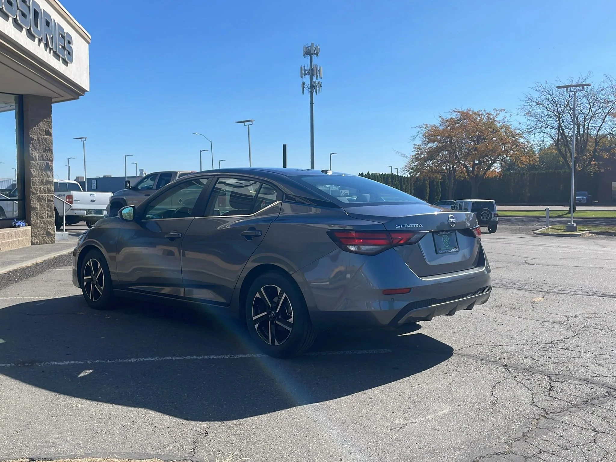 Used 2024 Gun Metallic Nissan SV image 5