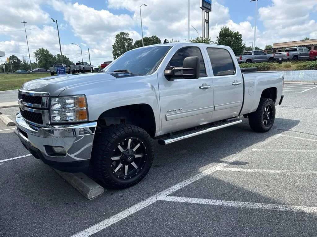 Used 2013 SILVER ICE METALLIC Chevrolet SRW LTZ image 1