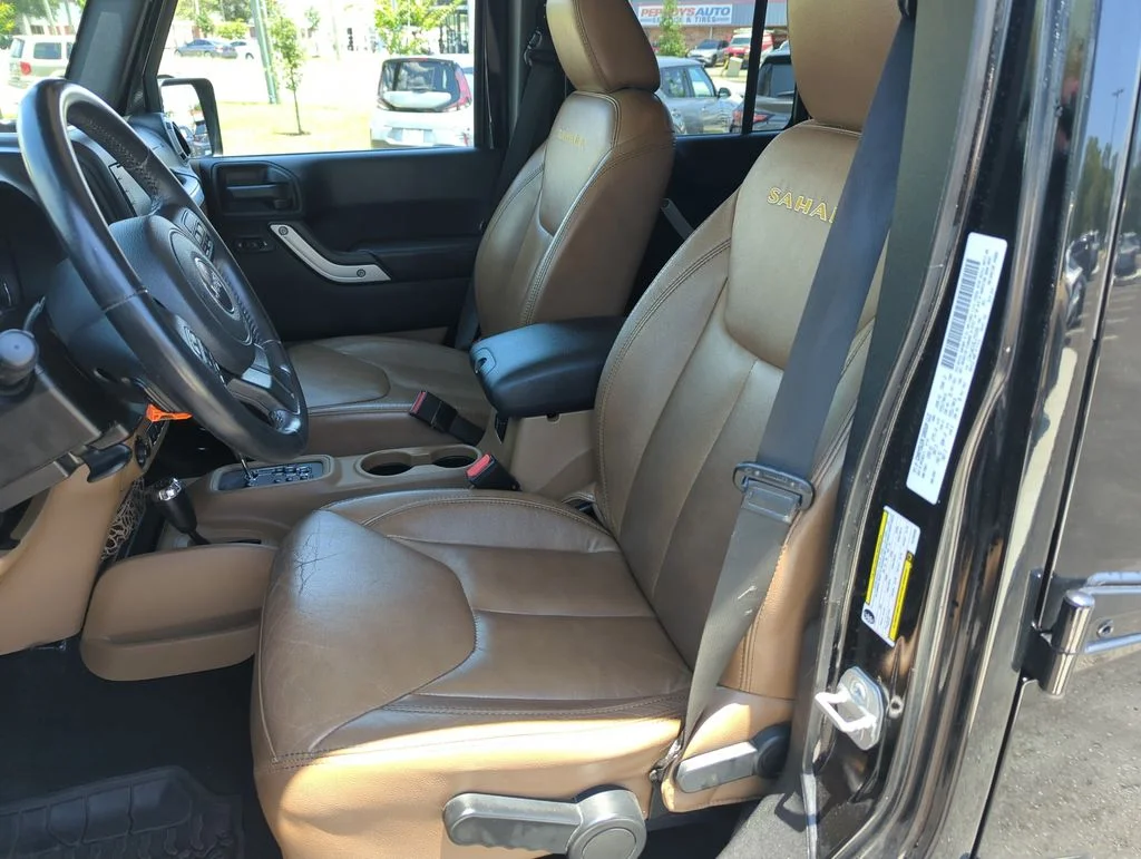 Used 2014 Black Jeep Unlimited Sahara image 12