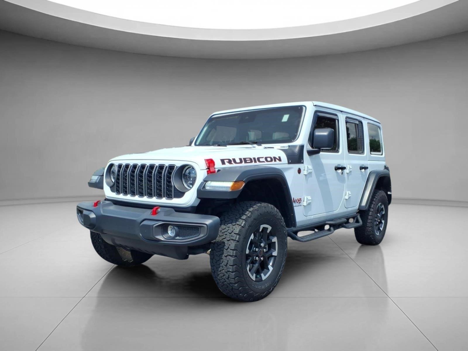 Used 2025 Bright White Clearcoat Jeep Rubicon image 1