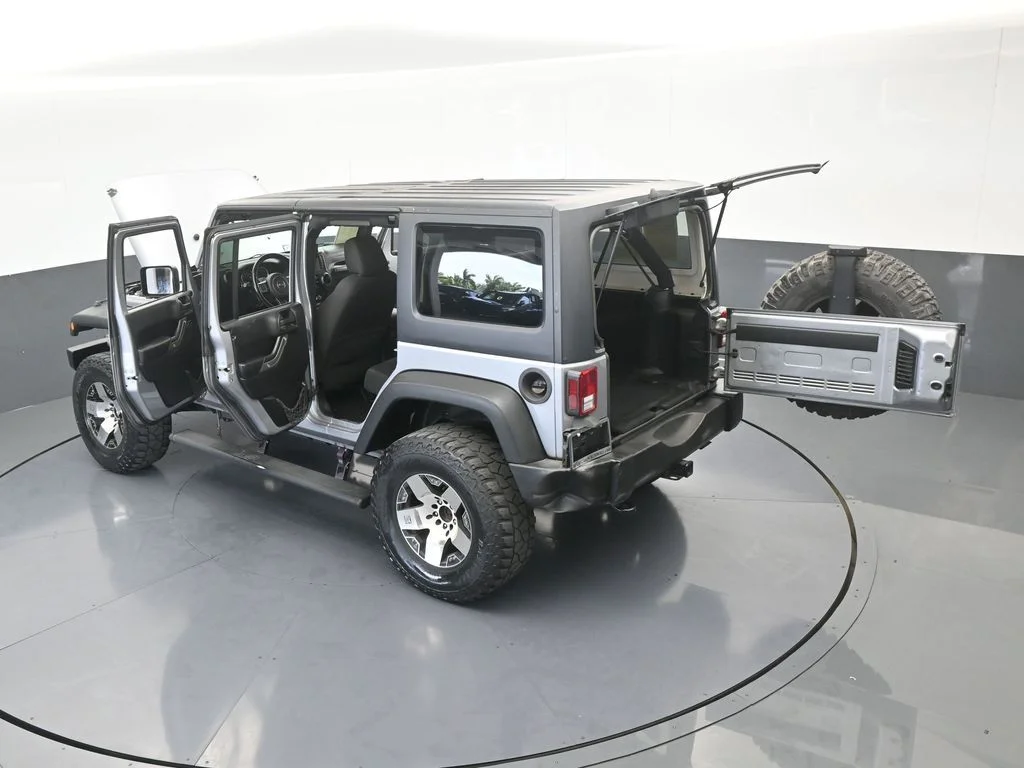 Used 2016 Billet Silver Metallic Clearcoat Jeep Unlimited Sport image 65