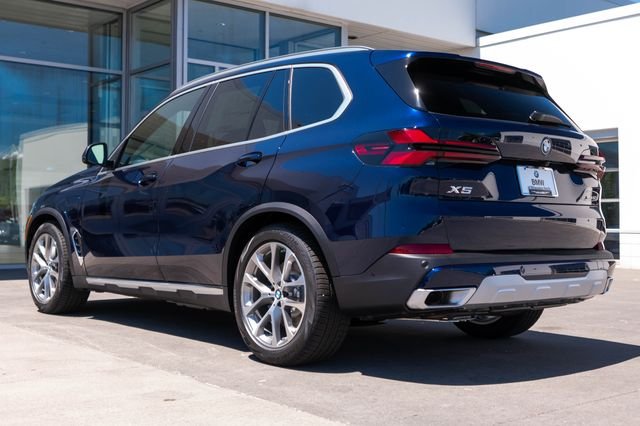 New 2026 Tanzanite Blue II Metallic BMW xDrive50e image 3