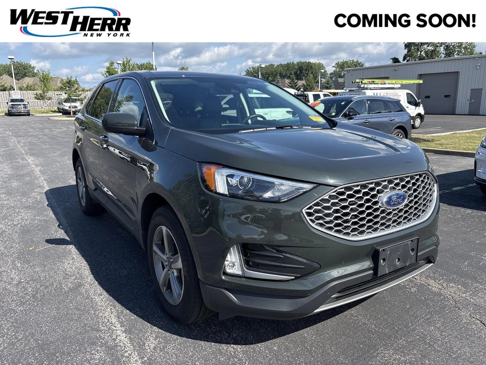 Used 2023 Forged Green Metallic Ford SEL image 1