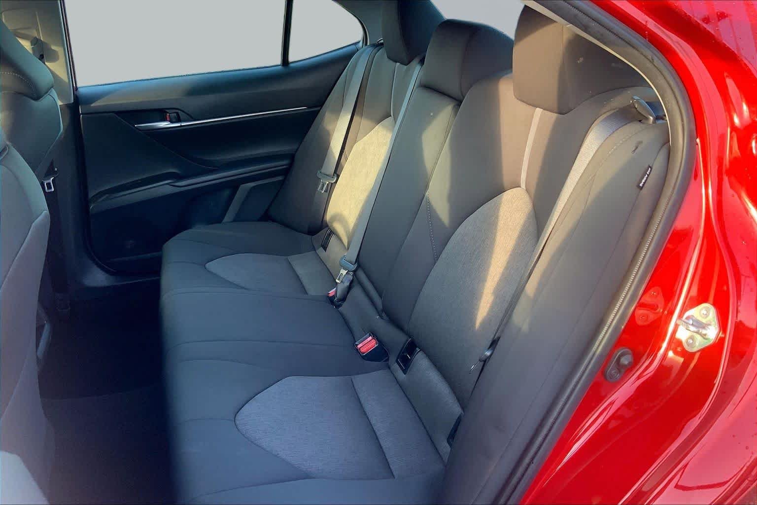 Used 2024 Supersonic Red Toyota LE image 19